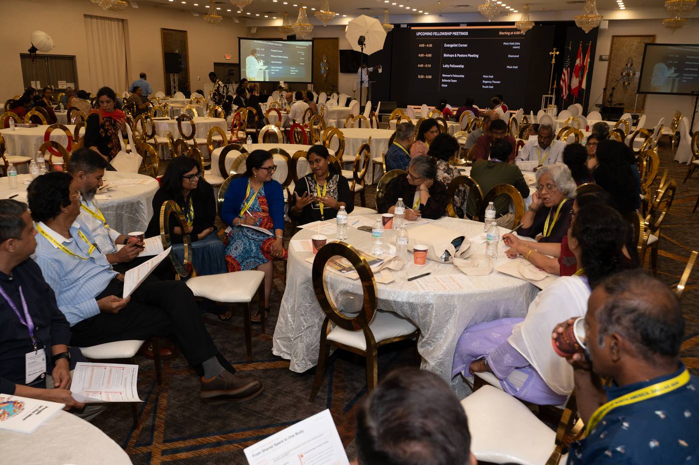 Adults at a session table discussion