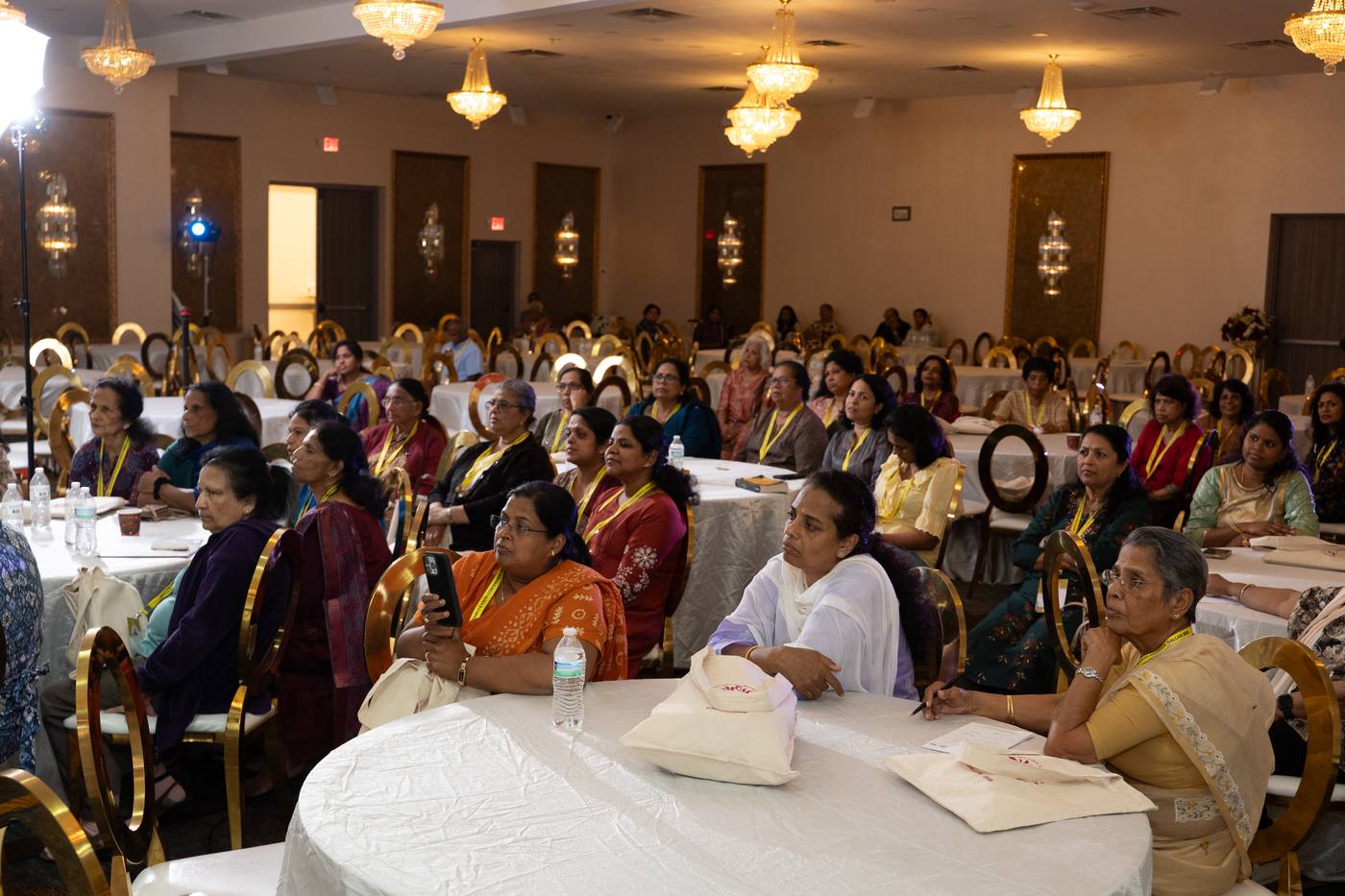 Attendees during a general session